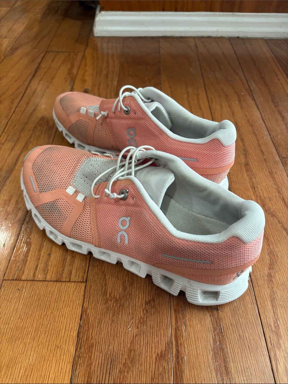 On Running Women’s Athletic Shoes in Coral and White